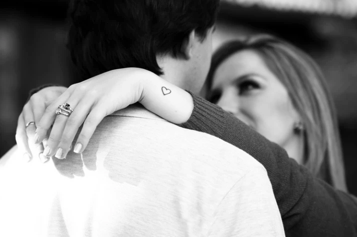 Photograph of newly engaged happy couple