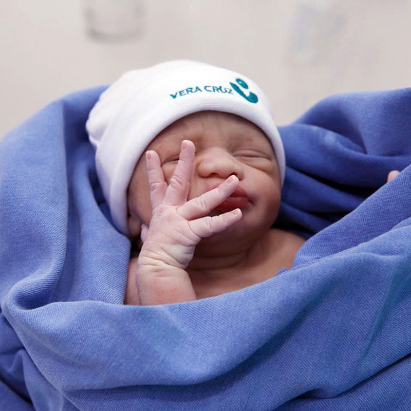 Newborn baby in hospital blankets